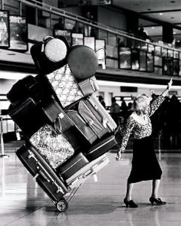 woman too much luggage